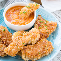 Crispy Coconut Chicken Tenders {with Sweet and Spicy Dipping Sauce}