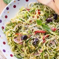 Zucchini and Cucumber Noodle Antipasto Salad {with Sun-Dried Tomato-Basil Vinaigrette}
