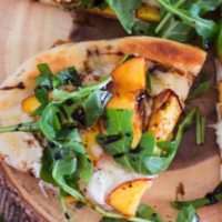 Grilled Peach Pizzas {with Arugula and Balsamic Glaze}